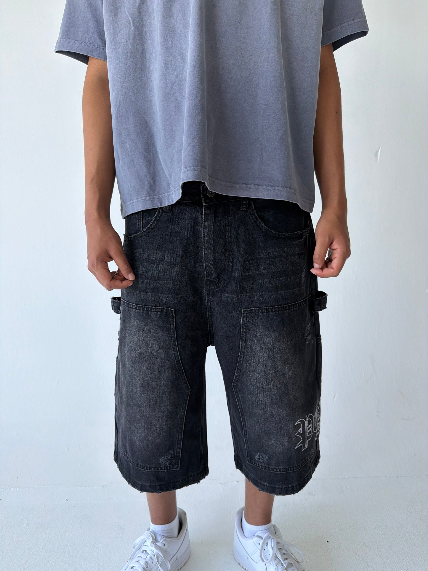 Monogram Distressed Baggy Carpenter Jorts in Black