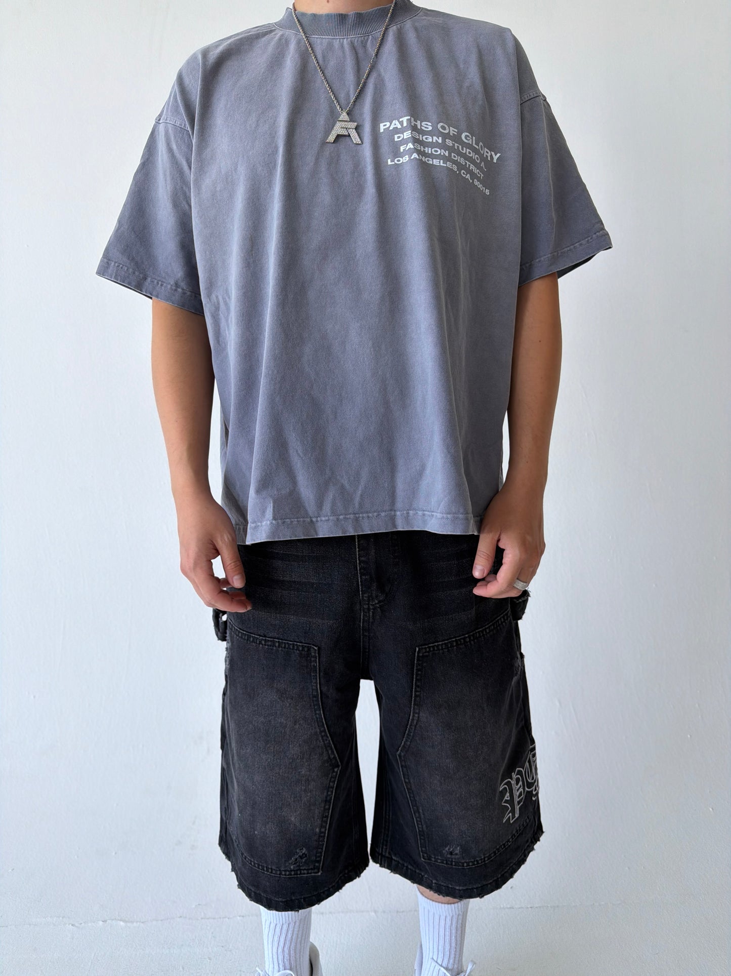 Monogram Distressed Baggy Carpenter Jorts in Black