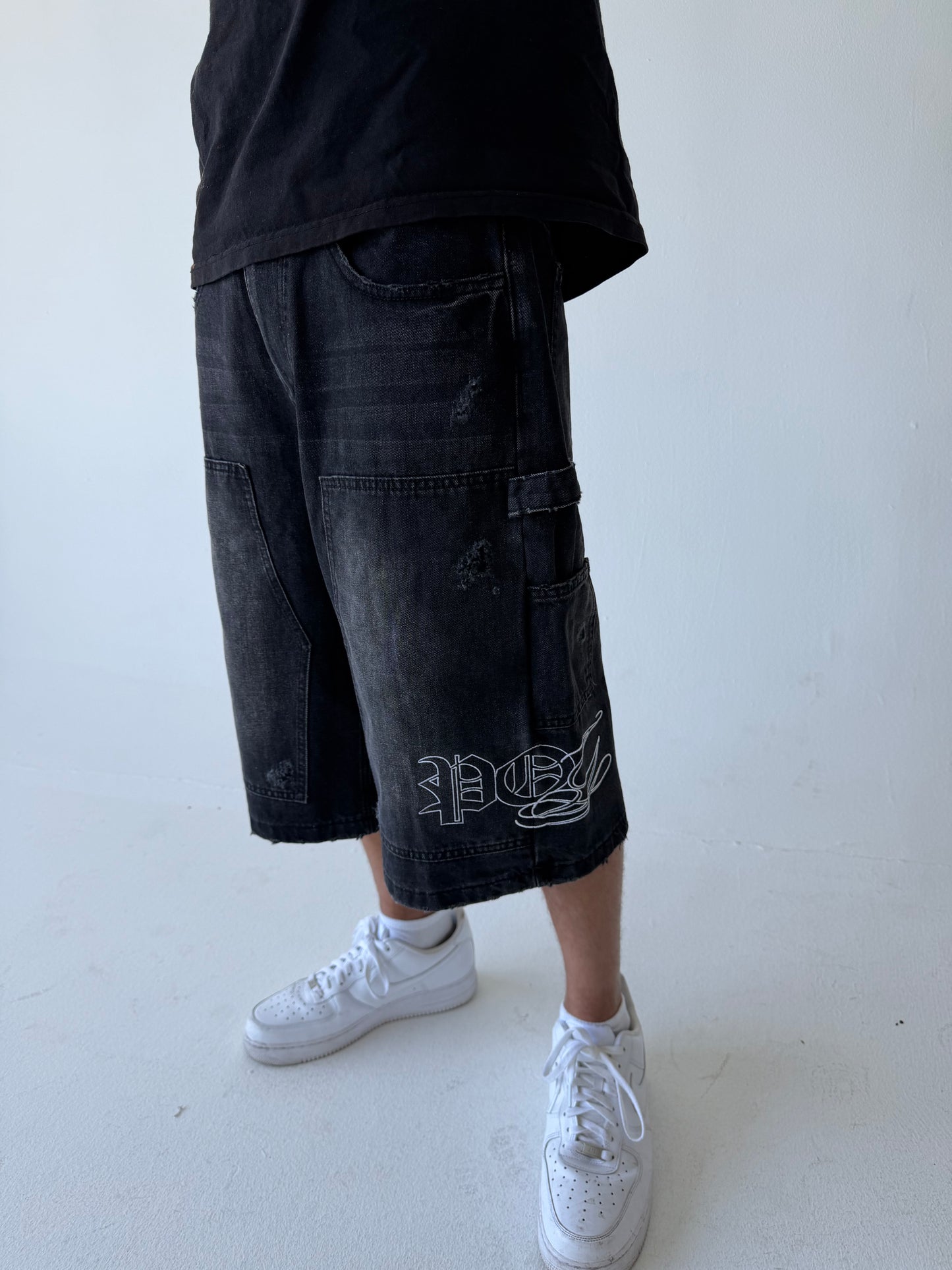 Monogram Distressed Baggy Carpenter Jorts in Black